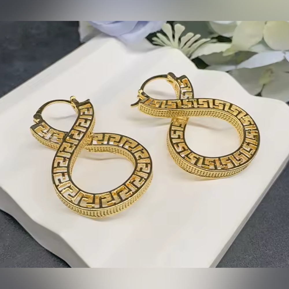 18K Gold Infinity Shape Hoop Style Earrings With Greek Style Design - Picture 5 of 7